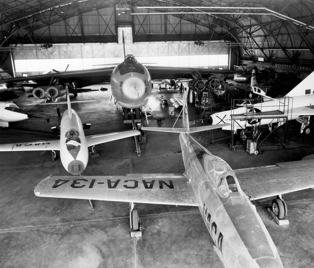 A B-47A stands at the center of a NACA hangar among research aircraft in 1953; not the encounter aircraft.
