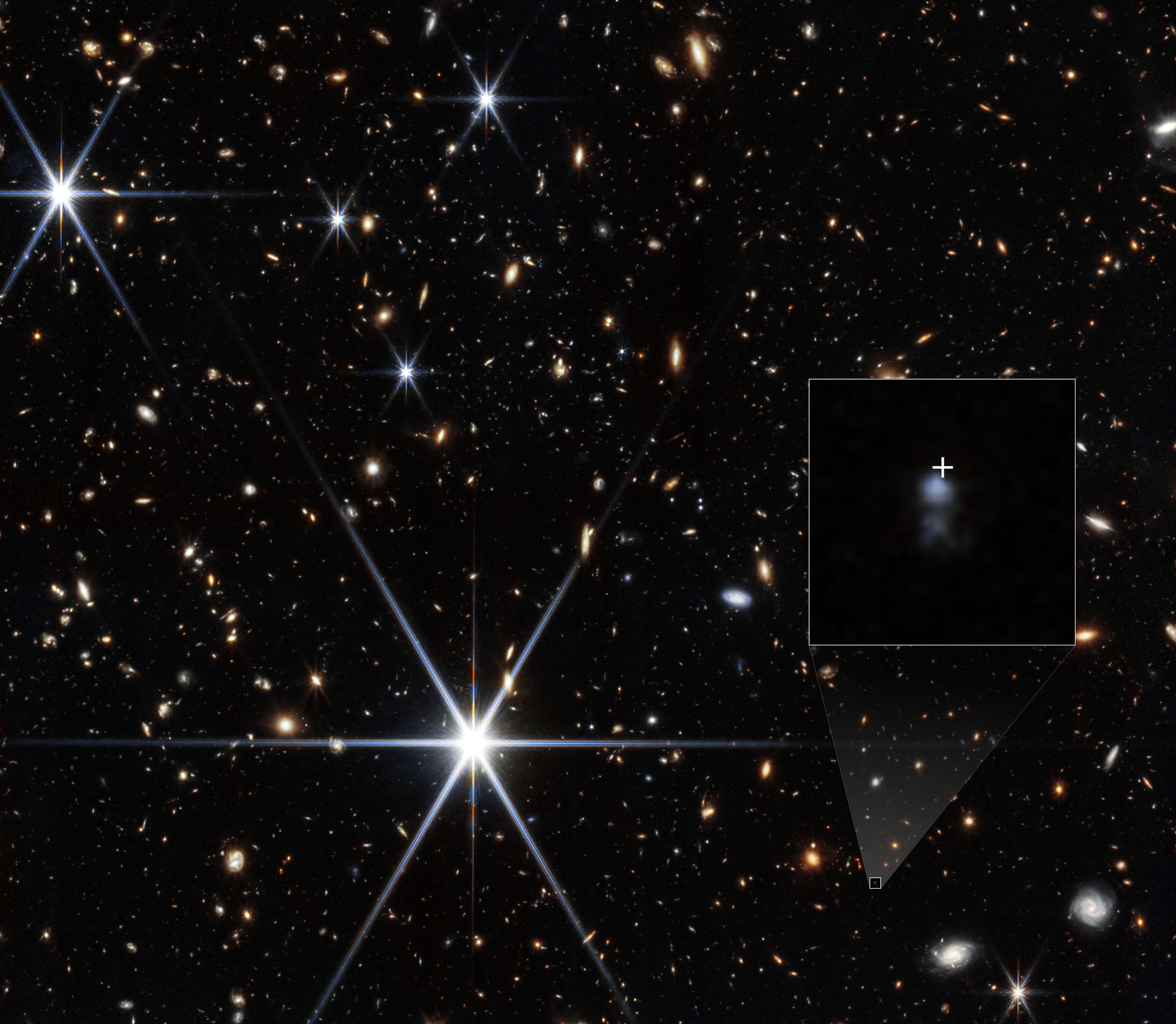 Webb infrared galaxy field with a magnified view and cross marking the location of fast radio burst FRB 20240304B